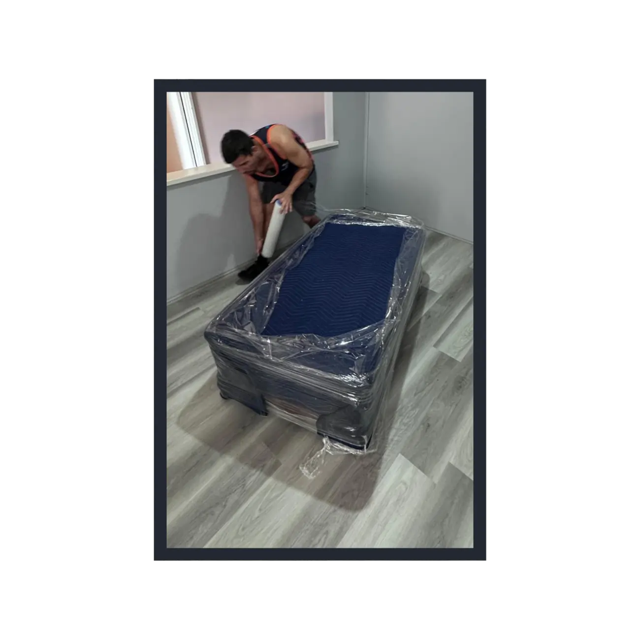 Sofa professionally wrapped and protected for moving
